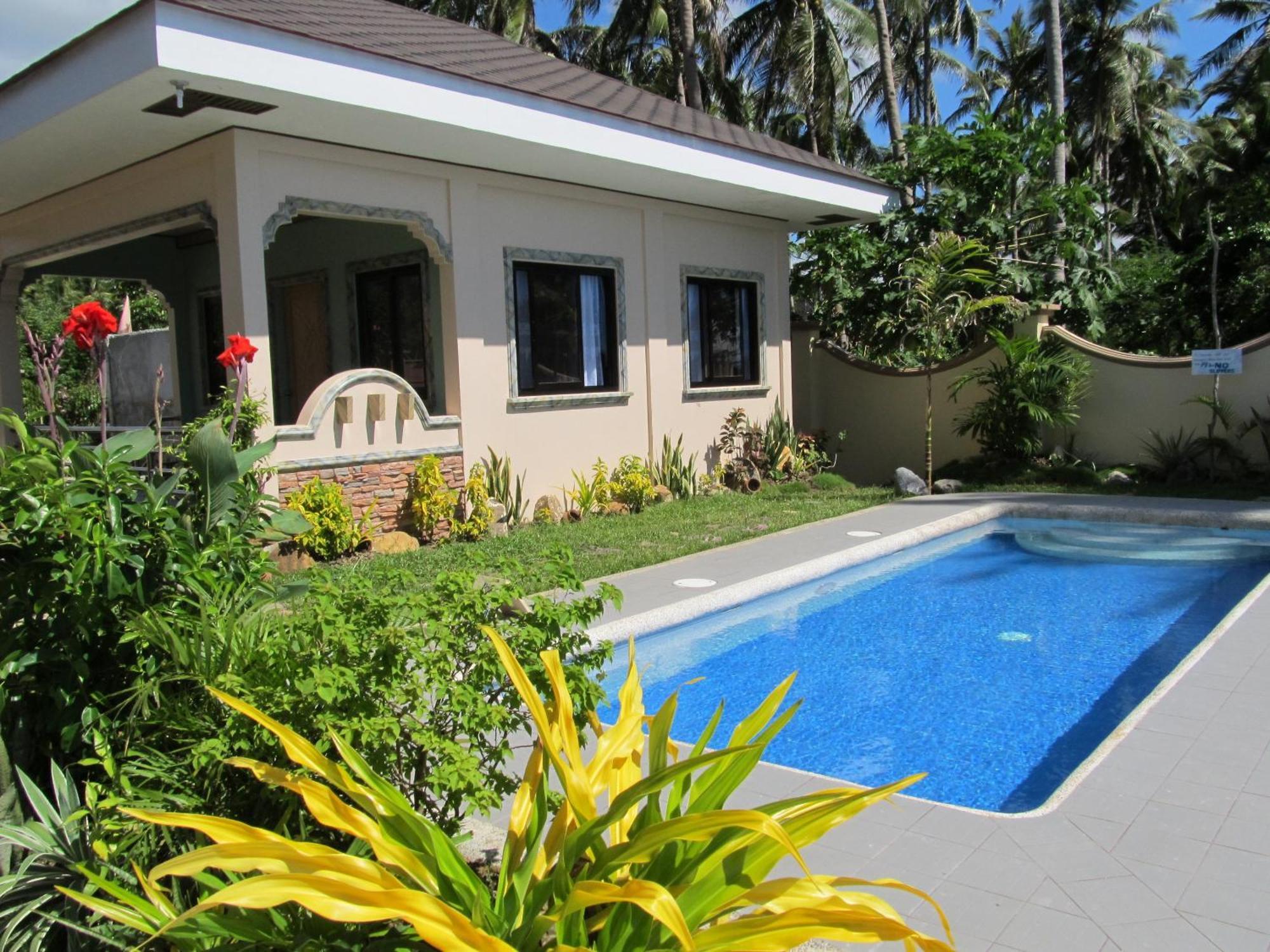Ucoy Beach Resort Libertad Kültér fotó